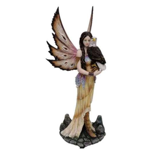 A statuette of a woman with pink butterfly wings in a seashell dress, staring resolutely ahead, a bald eagle perched on her shoulder.